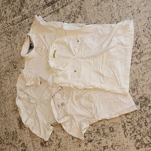 Four white polos